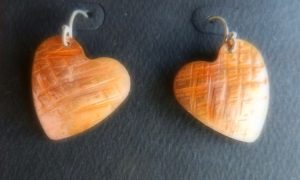 Cross Hatch Heart earrings in bare copper hung on Sterling ear wires